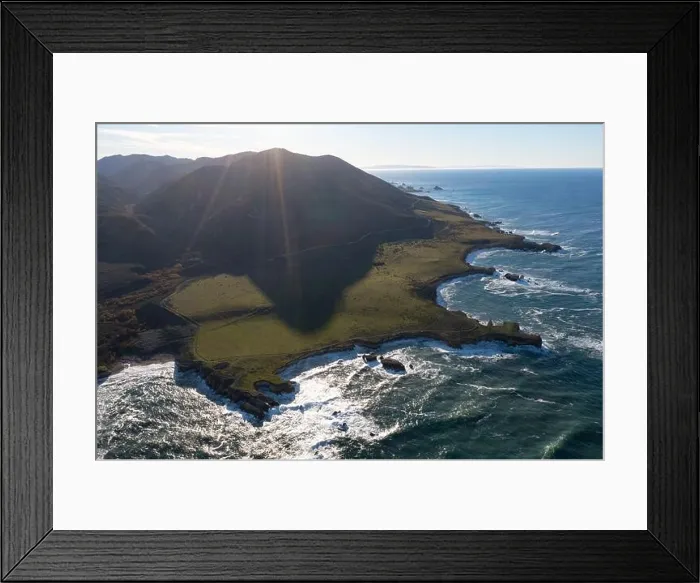 Framed Print : The Pacific Ocean meets the beautiful and rocky shoreline of Central California, near Morro Bay. This scenic region is a popular vacation destination Framed Print : The Pacific Ocean meets the beautiful and rocky shoreline of Central California, near Morro Bay. This scenic region is a popular vacation destination
