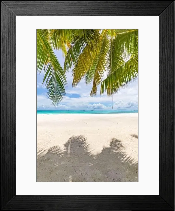Framed Print : Palm tree leaves over luxury beach. Perfect tropical white sand beach with coconut palm, summer vacation holiday background concept Framed Print : Palm tree leaves over luxury beach. Perfect tropical white sand beach with coconut palm, summer vacation holiday background concept