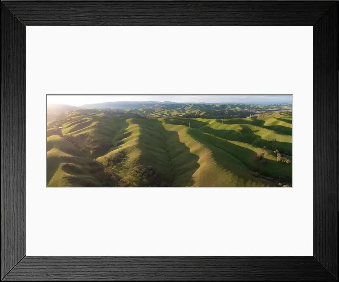 Framed Print : Bright morning sunlight shines on green, grass-covered hills in the Tri-valley region of Northern California, just east of San Francisco Bay Framed Print : Bright morning sunlight shines on green, grass-covered hills in the Tri-valley region of Northern California, just east of San Francisco Bay