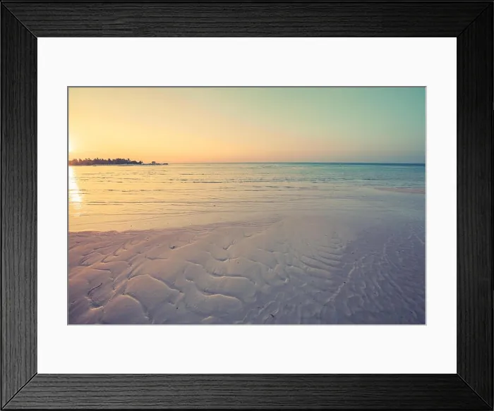 Framed Print : Beautiful sunset background, tropical beach landscape, shallow sea water in paradise island background. Tranquil nature sunset on the beach Framed Print : Beautiful sunset background, tropical beach landscape, shallow sea water in paradise island background. Tranquil nature sunset on the beach
