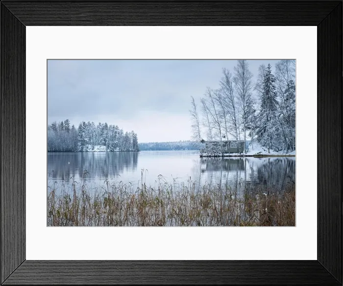 Framed Print : Winter landscape with sauna cottage and peaceful lake at evening in Finland Framed Print : Winter landscape with sauna cottage and peaceful lake at evening in Finland