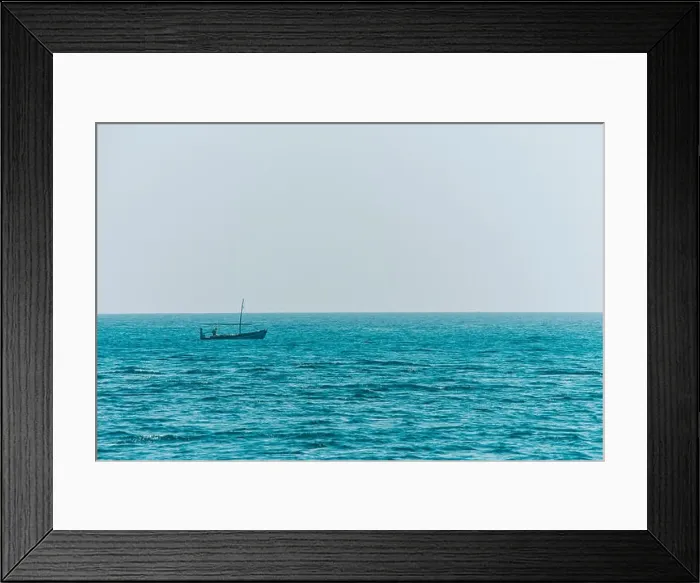 Framed Print : Small boat fishing in endless ocean water Framed Print : Small boat fishing in endless ocean water