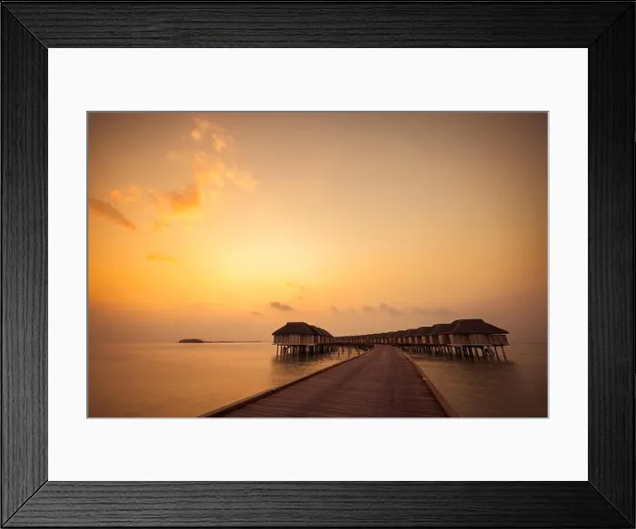 Framed Print : Amazing sunset sky and reflection on calm sea, Maldives beach landscape of luxury over water bungalows. Exotic scenery of summer vacation and holiday Framed Print : Amazing sunset sky and reflection on calm sea, Maldives beach landscape of luxury over water bungalows. Exotic scenery of summer vacation and holiday