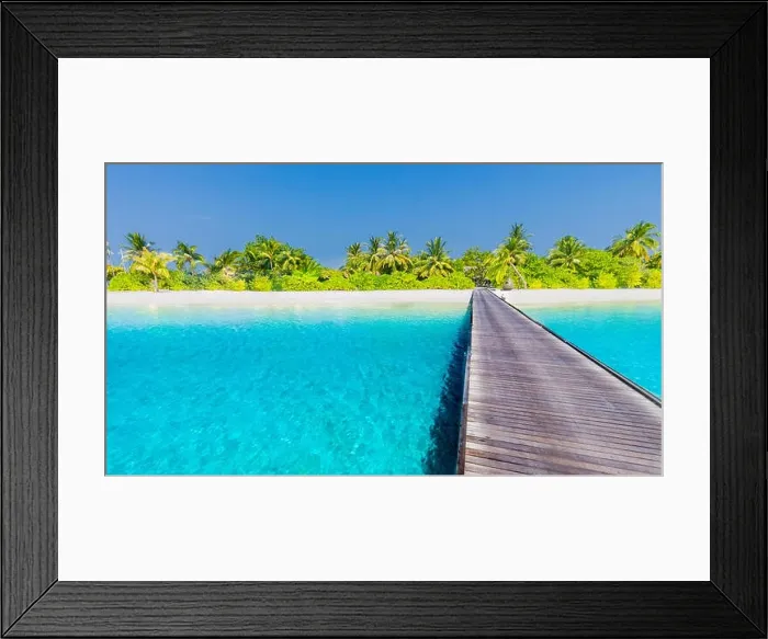 Framed Print : Maldives island beach panorama. Palm trees and beach bar and long wooden pier pathway. Tropical vacation and summer holiday background concept Framed Print : Maldives island beach panorama. Palm trees and beach bar and long wooden pier pathway. Tropical vacation and summer holiday background concept