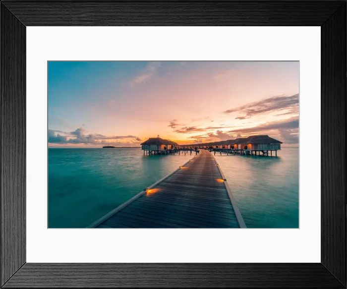 Framed Print : Maldives island and water villas. Island in ocean, overwater villas at the time sunset with led lights and twilight sky. Luxury resort, jetty bungalow Framed Print : Maldives island and water villas. Island in ocean, overwater villas at the time sunset with led lights and twilight sky. Luxury resort, jetty bungalow
