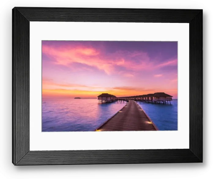 Framed Print : Sunset landscape on Maldives island beach, water villas resort. Beautiful sky and clouds Framed Print : Sunset landscape on Maldives island beach, water villas resort. Beautiful sky and clouds