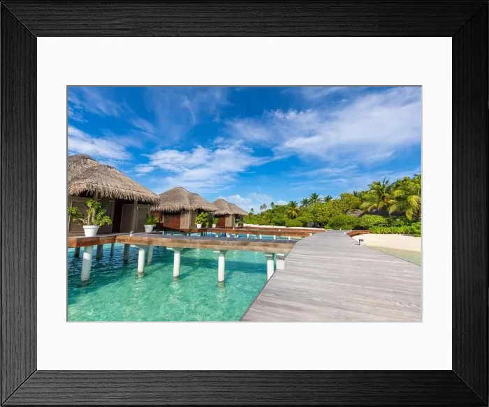 Framed Print : Water Villas bungalows on the perfect tropical Island, beautiful white sand on tropical beach blue water blue sky with coconut palm, Maldives islands Framed Print : Water Villas bungalows on the perfect tropical Island, beautiful white sand on tropical beach blue water blue sky with coconut palm, Maldives islands