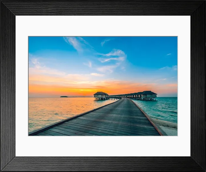 Framed Print : Sunset landscape on Maldives island beach, water villas resort. Beautiful sky and clouds Framed Print : Sunset landscape on Maldives island beach, water villas resort. Beautiful sky and clouds