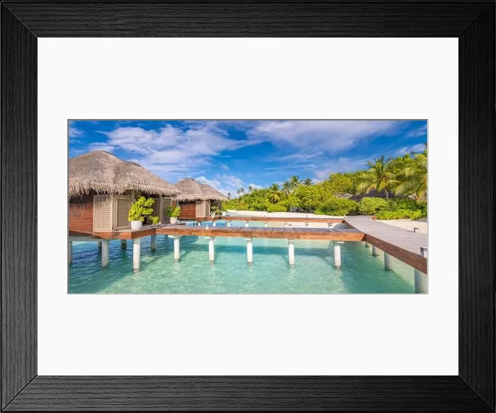 Framed Print : Water Villas bungalows on the perfect tropical Island, beautiful white sand on tropical beach blue water blue sky with coconut palm, Maldives islands Framed Print : Water Villas bungalows on the perfect tropical Island, beautiful white sand on tropical beach blue water blue sky with coconut palm, Maldives islands