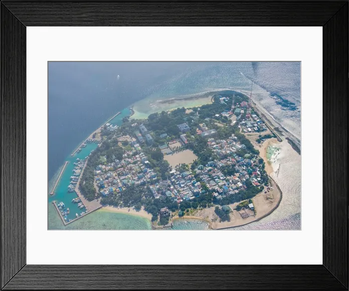 Framed Print : Aerial Maldives island landscape with local island beach and dock on atoll island Framed Print : Aerial Maldives island landscape with local island beach and dock on atoll island