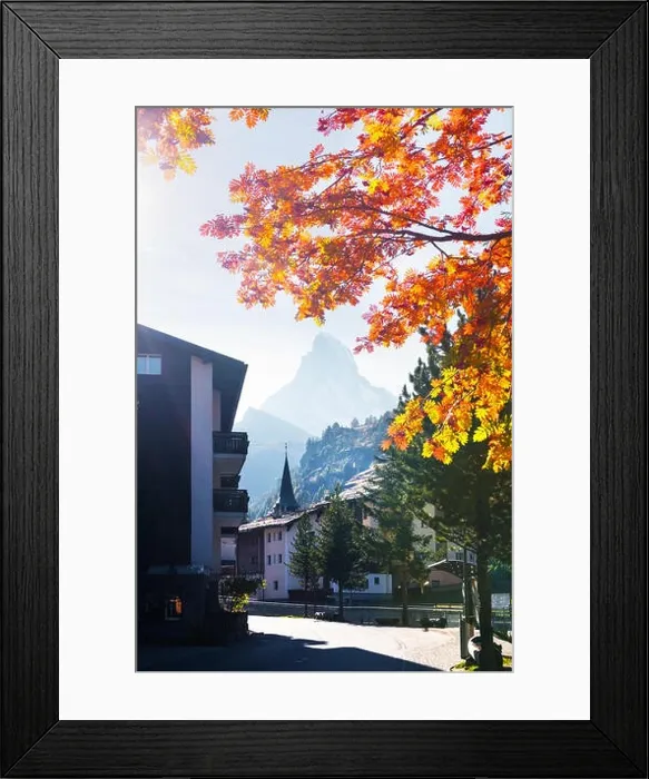 Framed Print : Picturesque view of Zermatt city street with Matterhorn peak and yellow ash tree in Swiss Alps. Switzerland, Europe. Landscape photography Framed Print : Picturesque view of Zermatt city street with Matterhorn peak and yellow ash tree in Swiss Alps. Switzerland, Europe. Landscape photography