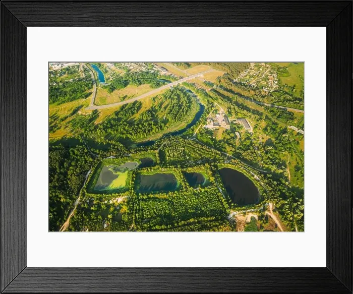 Framed Print : Aerial View Retention Basins, Wet Pond, Wet Detention Basin Or Stormwater Management Pond, Is An Artificial Pond With Vegetation Around The Perimeter Framed Print : Aerial View Retention Basins, Wet Pond, Wet Detention Basin Or Stormwater Management Pond, Is An Artificial Pond With Vegetation Around The Perimeter