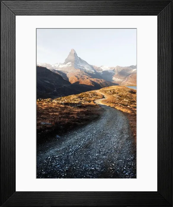 Framed Print : Picturesque view of Matterhorn Cervino peak, dirt road and Stellisee lake in Swiss Alps. Zermatt resort location, Switzerland. Landscape photography Framed Print : Picturesque view of Matterhorn Cervino peak, dirt road and Stellisee lake in Swiss Alps. Zermatt resort location, Switzerland. Landscape photography