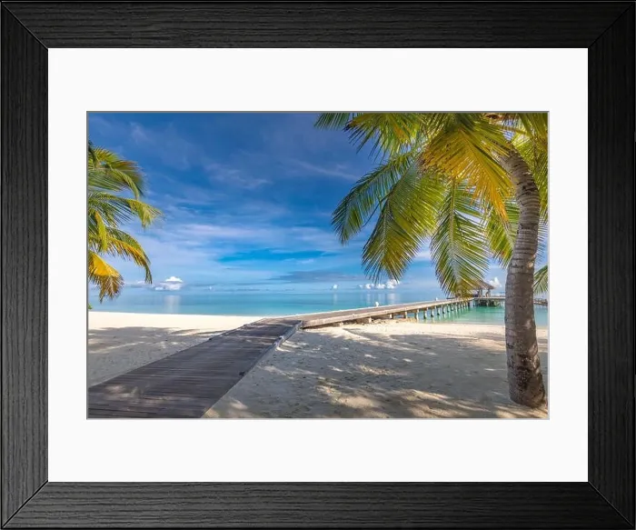 Framed Print : Tropical beach, Maldives. Jetty pathway into tranquil paradise island. Palm trees, white sand and blue sea, perfect summer vacation landscape holiday