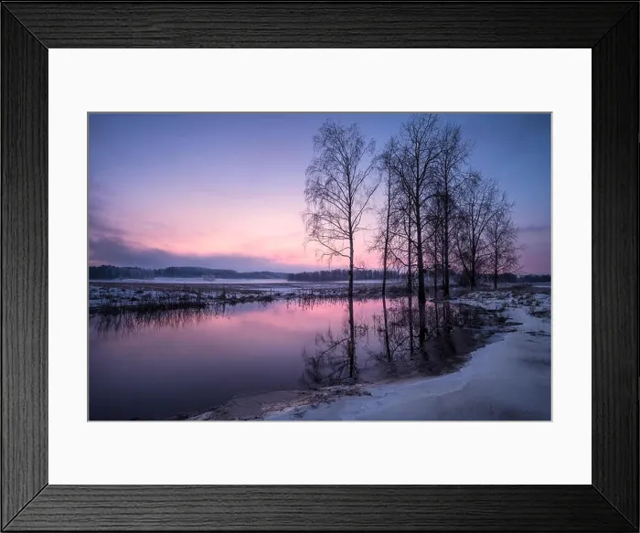 Framed Print : Winter landscape with sunset and smooth river at evening in Finland Framed Print : Winter landscape with sunset and smooth river at evening in Finland