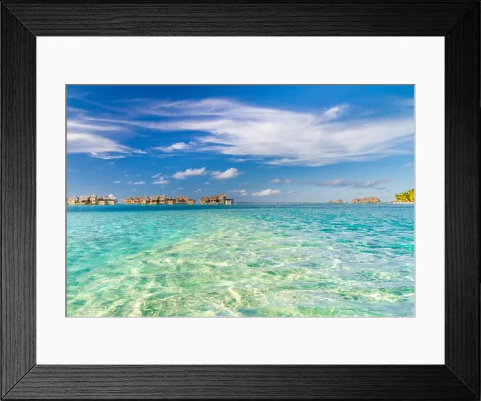 Framed Print : Wonderful turquoise tropical ocean in Maldives, blue sea view. Amazing seascape with tropical island with water villas, bungalows. Luxury travel Framed Print : Wonderful turquoise tropical ocean in Maldives, blue sea view. Amazing seascape with tropical island with water villas, bungalows. Luxury travel