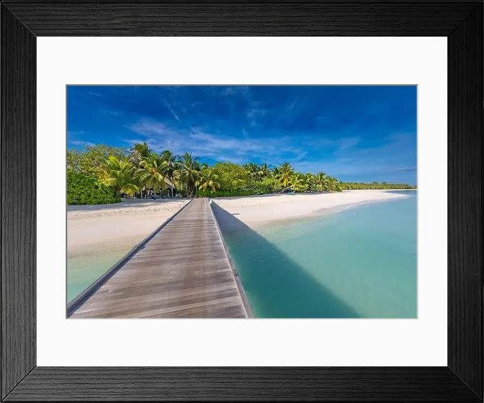Framed Print : Beautiful beach in Maldives. Long jetty vacations and tourism concept. Tropical resort beach landscape, paradise island, travel concept Framed Print : Beautiful beach in Maldives. Long jetty vacations and tourism concept. Tropical resort beach landscape, paradise island, travel concept
