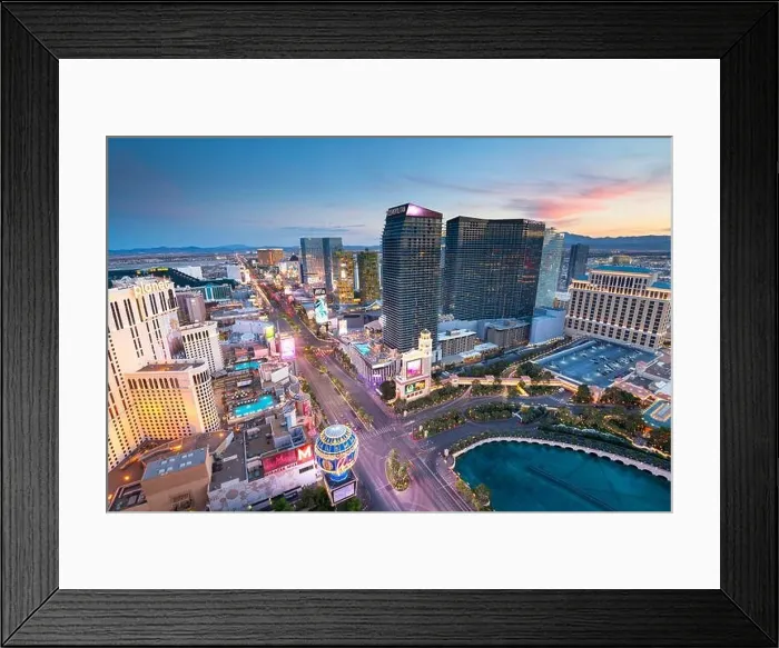 Framed Print : LAS VEGAS, NEVADA - APRIL 18, 2018: Hotels and Casinos along the strip at dusk Framed Print : LAS VEGAS, NEVADA - APRIL 18, 2018: Hotels and Casinos along the strip at dusk