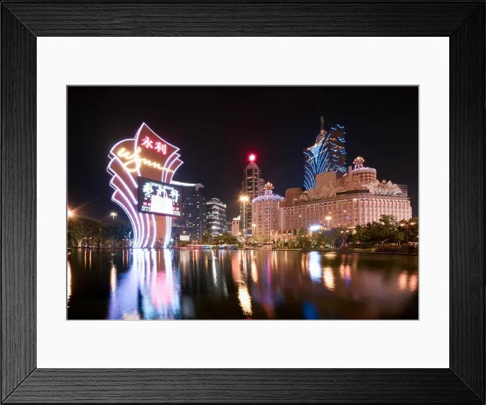 Framed Print : Macau, China - October 14, 2017: Night view of Macau (Macao). The Grand Lisboa is the tallest building in Macau (Macao) and the most distinctive part Framed Print : Macau, China - October 14, 2017: Night view of Macau (Macao). The Grand Lisboa is the tallest building in Macau (Macao) and the most distinctive part