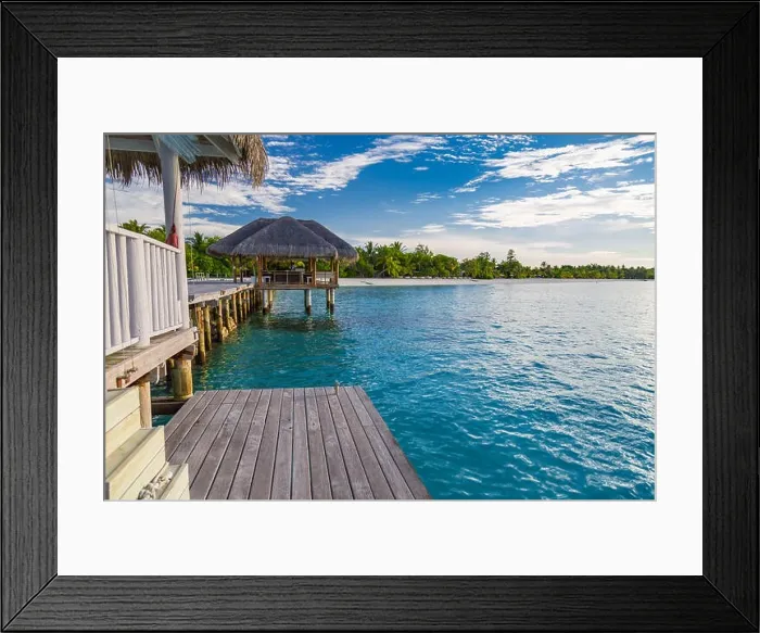 Framed Print : landscape of Maldives beach. Tropical panorama, luxury water villa resort with wooden pier or jetty. Luxury summer travel destination vacation Framed Print : landscape of Maldives beach. Tropical panorama, luxury water villa resort with wooden pier or jetty. Luxury summer travel destination vacation