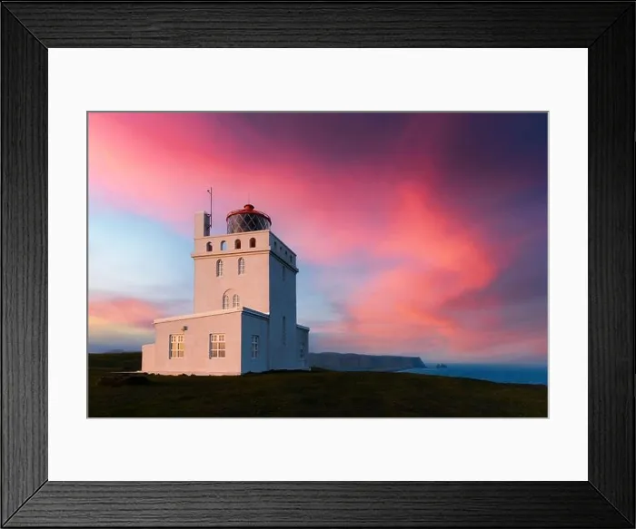 Framed Print : Incredible evening view of Dyrholaey Lighthouse at Cape Dyrholaey, south coast of Iceland. Great purple sunset glowing on background Framed Print : Incredible evening view of Dyrholaey Lighthouse at Cape Dyrholaey, south coast of Iceland. Great purple sunset glowing on background