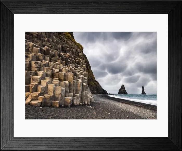 Framed Print : Incredible view on Black beach and Troll toes cliffs in cloudy weather. Stormy sky with menacing mammatus clouds on background Framed Print : Incredible view on Black beach and Troll toes cliffs in cloudy weather. Stormy sky with menacing mammatus clouds on background