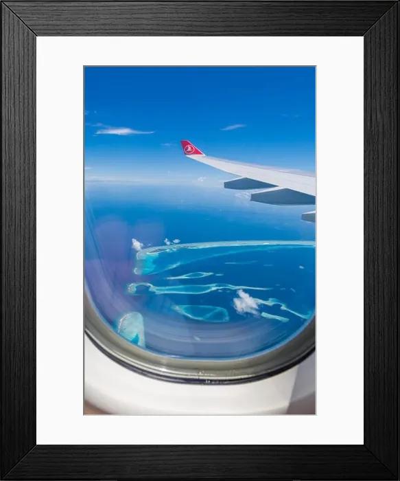 Framed Print : 10.12.2016 - Maldives, Male: Turkish Airlines Being 777 landing in Maldives capital city and airport, blue sea and island view from plane Framed Print : 10.12.2016 - Maldives, Male: Turkish Airlines Being 777 landing in Maldives capital city and airport, blue sea and island view from plane