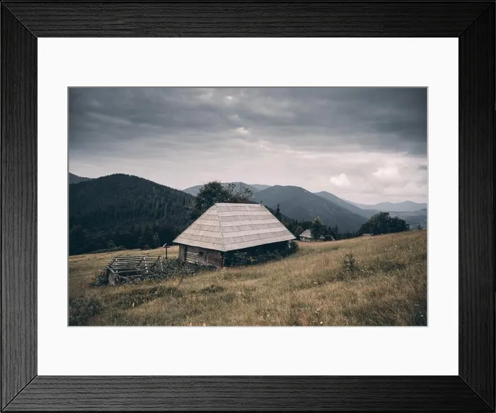 Framed Print : Picturesque autumn meadow with old wooden house and cloudy sky in the Carpathian mountains, Ukraine. Landscape photography Framed Print : Picturesque autumn meadow with old wooden house and cloudy sky in the Carpathian mountains, Ukraine. Landscape photography