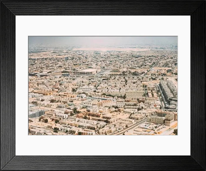 Framed Print : Aerial View Of Cityscape Of Dubai From Window Of Plane. United Arab Emirates Framed Print : Aerial View Of Cityscape Of Dubai From Window Of Plane. United Arab Emirates