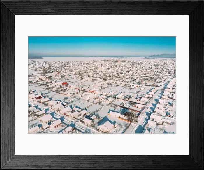 Framed Print : Dobrush, Gomel Region, Belarus. Aerial View Of Skyline Cityscape In Sunny Winter Day. Snowy Landscape Cityscape Skyline Framed Print : Dobrush, Gomel Region, Belarus. Aerial View Of Skyline Cityscape In Sunny Winter Day. Snowy Landscape Cityscape Skyline