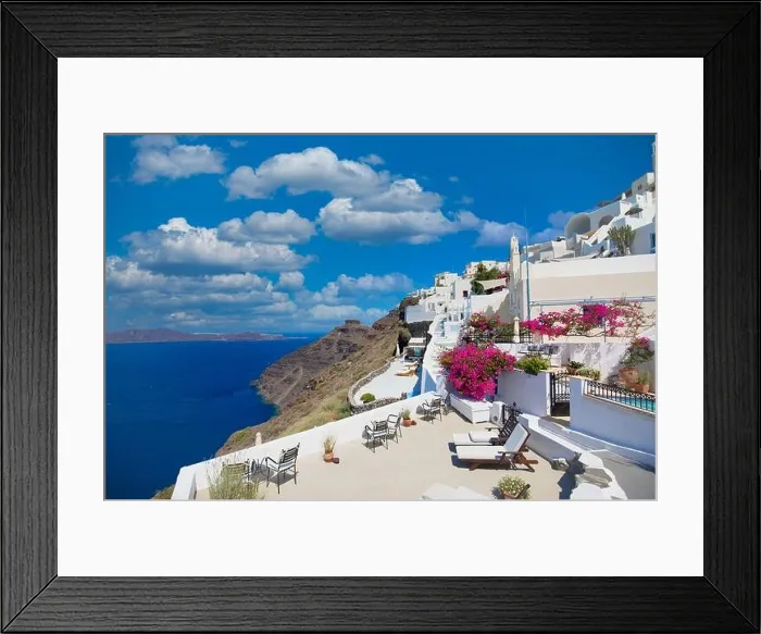 Framed Print : Amazing panoramic landscape, luxury travel vacation. Oia town on Santorini island, Greece. Traditional and famous white architecture and pink flowers Framed Print : Amazing panoramic landscape, luxury travel vacation. Oia town on Santorini island, Greece. Traditional and famous white architecture and pink flowers