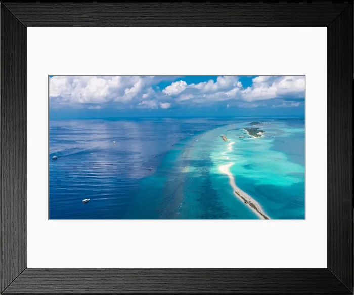 Framed Print : Group of atolls and islands in Maldives from aerial view. Beautiful Maldives landscape, blue sea Framed Print : Group of atolls and islands in Maldives from aerial view. Beautiful Maldives landscape, blue sea