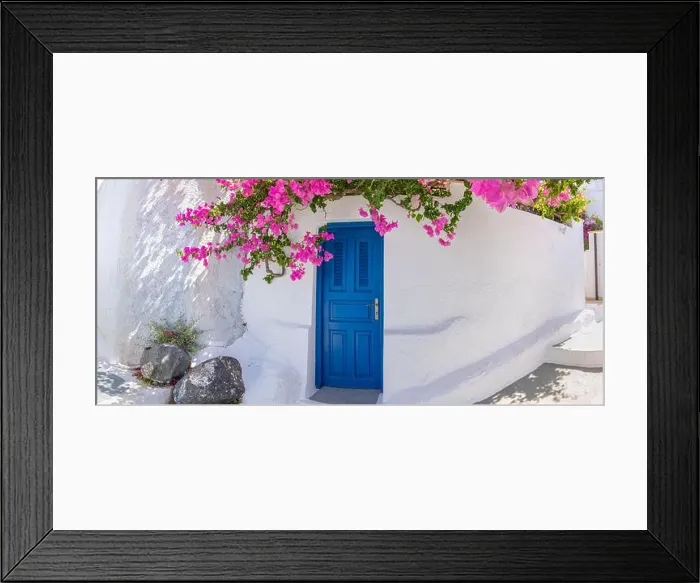 Framed Print : Romantic blue door with pink flowers, idyllic nature. Couple honeymoon destination, urban street banner. Santorini, Greece Framed Print : Romantic blue door with pink flowers, idyllic nature. Couple honeymoon destination, urban street banner. Santorini, Greece