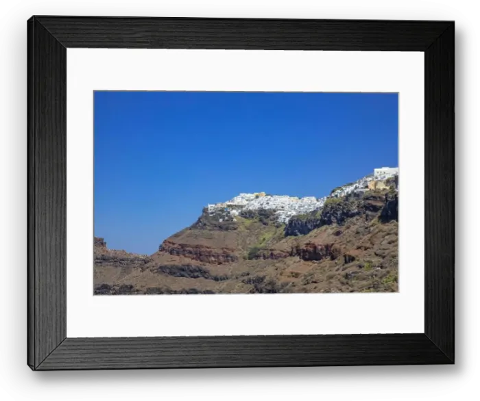Framed Print : Cliff wall of Santorini island, Greece. Clear blue ocean, sea, with copy space, place for text. Shore, coast of dry rocks Framed Print : Cliff wall of Santorini island, Greece. Clear blue ocean, sea, with copy space, place for text. Shore, coast of dry rocks