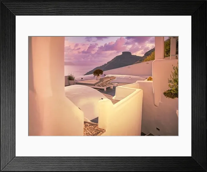 Framed Print : Santorini island, Oia sunset caldera scene, two sun beds, loungers, white architecture sea view colorful sky calm relax. Inspirational beach resort