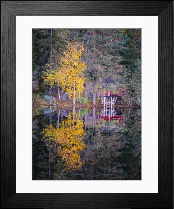 Framed Print : Idyllic lake view with cozy cottage and fall colors reflection at autumn day in Finland Framed Print : Idyllic lake view with cozy cottage and fall colors reflection at autumn day in Finland