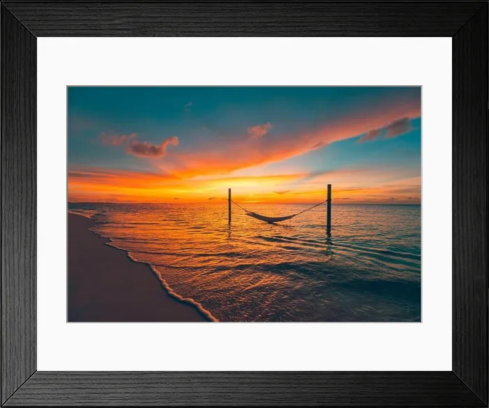 Framed Print : Silhouette of over water hammock with amazing stunning water reflection and seascape, skyscape. Beautiful sunset on the tropical sea beach background Framed Print : Silhouette of over water hammock with amazing stunning water reflection and seascape, skyscape. Beautiful sunset on the tropical sea beach background