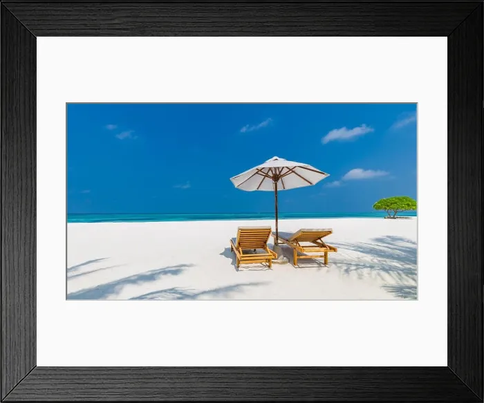 Framed Print : Perfect couple and romantic love beach background. Two lounge chairs and umbrella on white sand near the sea. Luxury vacation and holiday concept Framed Print : Perfect couple and romantic love beach background. Two lounge chairs and umbrella on white sand near the sea. Luxury vacation and holiday concept