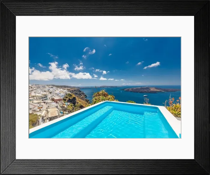 Framed Print : Beautiful resort on the island of Santorini. View of caldera and swimming pool in foreground, typical white architecture, amazing travel landscape Framed Print : Beautiful resort on the island of Santorini. View of caldera and swimming pool in foreground, typical white architecture, amazing travel landscape