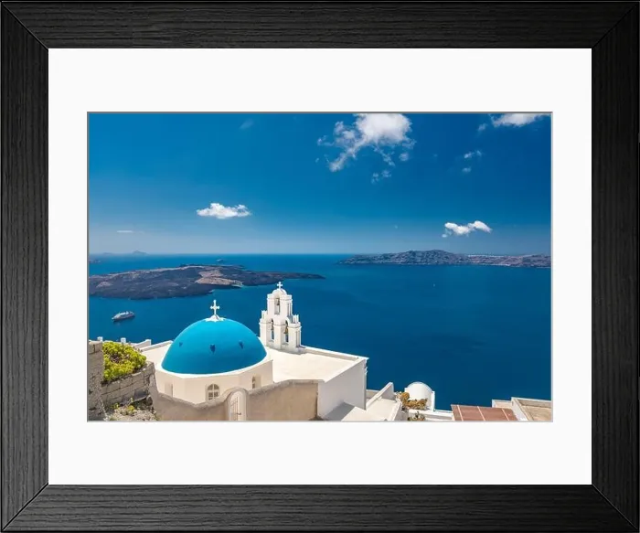 Framed Print : Summer island view in summer landscape. Thira town in Santorini island and the sea, Greek landscape cityscape. Blue dome over amazing blue sea view Framed Print : Summer island view in summer landscape. Thira town in Santorini island and the sea, Greek landscape cityscape. Blue dome over amazing blue sea view