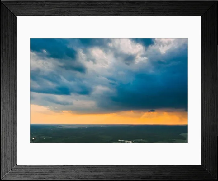 Framed Print : Aerial View. Sunset Sky Above Green Forest Landscape In Sunny Evening. Top View Of European Nature From High Attitude In Summer Sunrise. Bird's Eye Framed Print : Aerial View. Sunset Sky Above Green Forest Landscape In Sunny Evening. Top View Of European Nature From High Attitude In Summer Sunrise. Bird's Eye