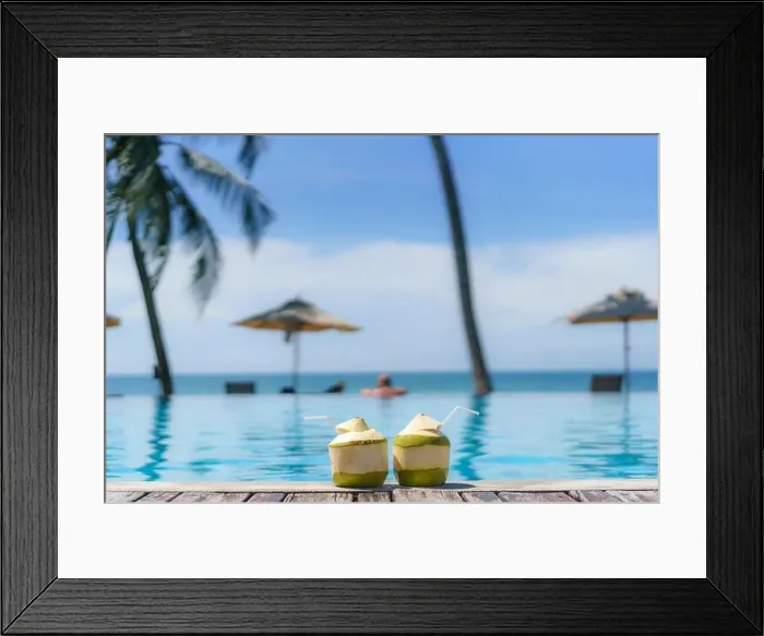Framed Print : Summer, Travel, Vacation and Holiday concept - Tropical fresh coconut cocktail with pool and beach in ocean, Phuket, Thailand Framed Print : Summer, Travel, Vacation and Holiday concept - Tropical fresh coconut cocktail with pool and beach in ocean, Phuket, Thailand