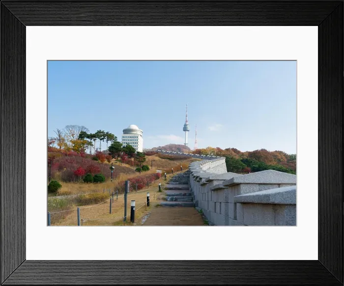 Framed Print : Seoul Tower with yellow and red autumn maple leaves at Namsan mountain in South Korea Framed Print : Seoul Tower with yellow and red autumn maple leaves at Namsan mountain in South Korea