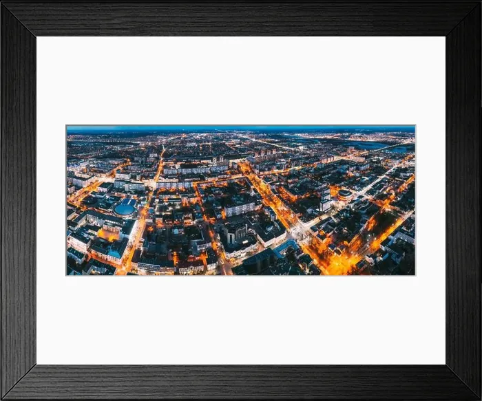 Framed Print : Brest, Belarus. Cityscape Skyline In Night Illuminations. Night Bird's-eye View Of Brest Market And Pedestrian Sovietskaya Street. Panorama, Panoramic Framed Print : Brest, Belarus. Cityscape Skyline In Night Illuminations. Night Bird's-eye View Of Brest Market And Pedestrian Sovietskaya Street. Panorama, Panoramic