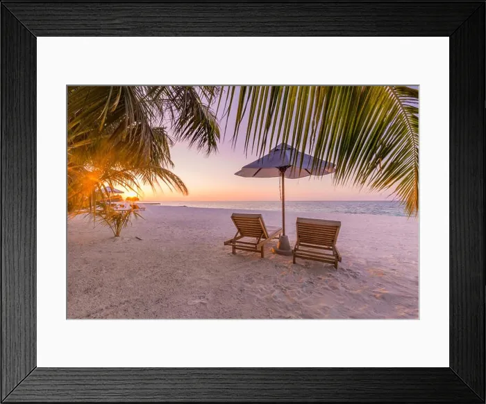 Framed Print : Beautiful tropical sunset scenery, two sun beds, loungers, umbrella under palm tree. Luxury resort, beach landscape with white sand and palm trees Framed Print : Beautiful tropical sunset scenery, two sun beds, loungers, umbrella under palm tree. Luxury resort, beach landscape with white sand and palm trees
