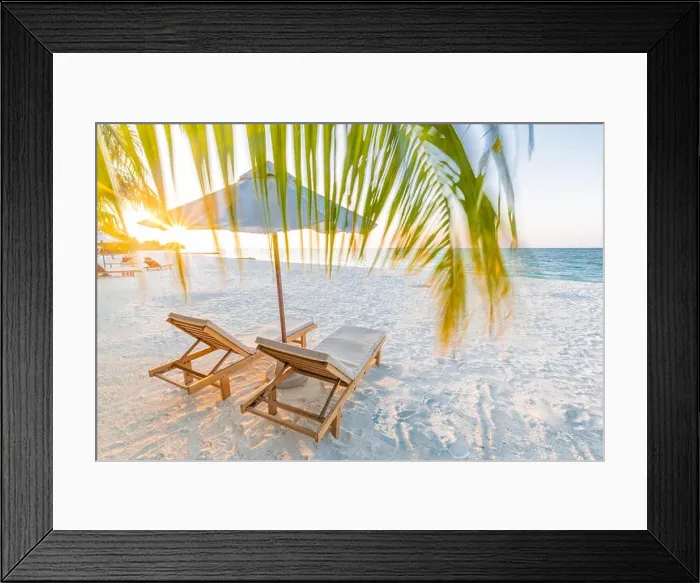 Framed Print : Beautiful tropical sunset scenery, two sun beds, loungers, umbrella under palm tree. Luxury resort, beach landscape with white sand and palm trees Framed Print : Beautiful tropical sunset scenery, two sun beds, loungers, umbrella under palm tree. Luxury resort, beach landscape with white sand and palm trees