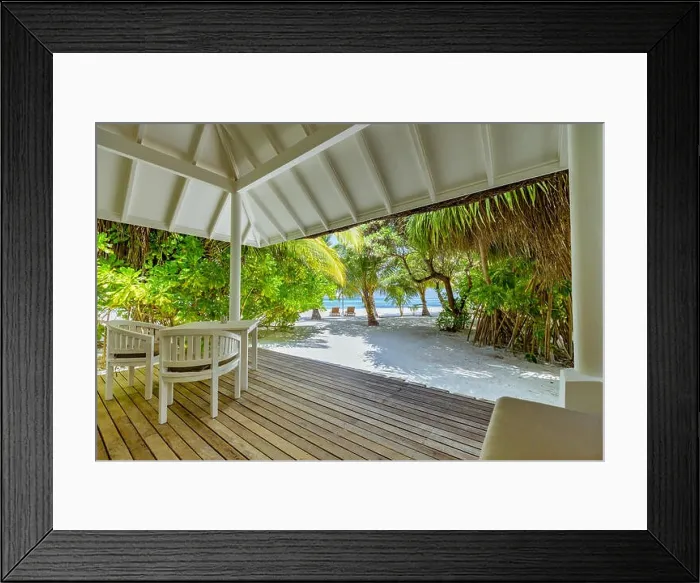 Framed Print : Luxury beach villa, backyard deck with chairs and table. Relaxing beach scene, palm trees, white sand and sea view Framed Print : Luxury beach villa, backyard deck with chairs and table. Relaxing beach scene, palm trees, white sand and sea view