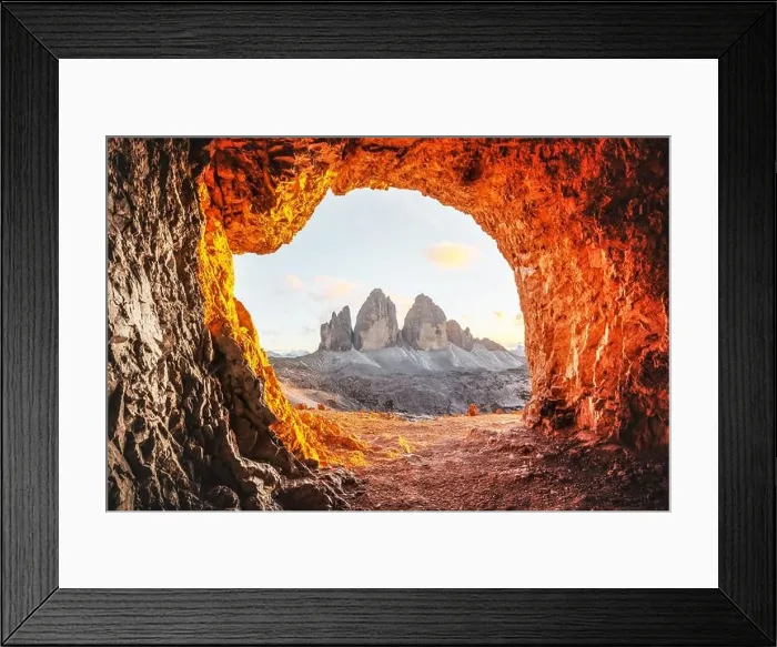 Framed Print : Tre Cime Di Lavaredo peaks in incredible orange sunset light. View from the cave in mountain against Three peaks of Lavaredo, Dolomite Alps, Italy Framed Print : Tre Cime Di Lavaredo peaks in incredible orange sunset light. View from the cave in mountain against Three peaks of Lavaredo, Dolomite Alps, Italy