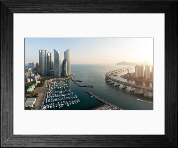 Framed Print : Panorama of Busan city skyline view at Haeundae district, Gwangalli Beach with yacht pier at Busan, South Korea Framed Print : Panorama of Busan city skyline view at Haeundae district, Gwangalli Beach with yacht pier at Busan, South Korea