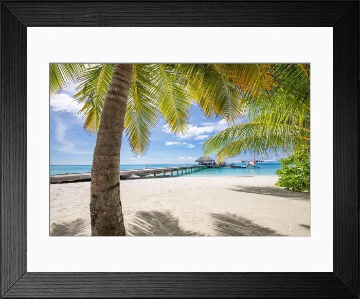 Framed Print : Beautiful tropical Maldives resort hotel and island with beach and sea on sky for holiday vacation background Framed Print : Beautiful tropical Maldives resort hotel and island with beach and sea on sky for holiday vacation background